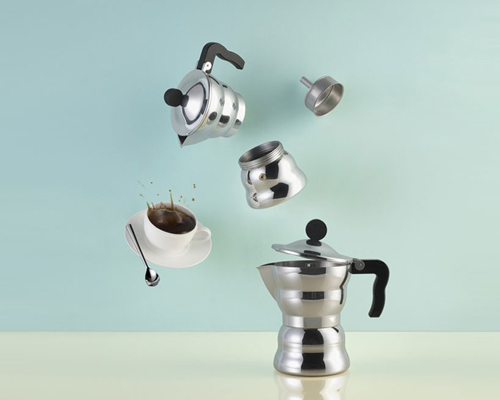 Traditional metal Italian coffee maker presented on a gray background with  copy space Stock Photo by Artjazz