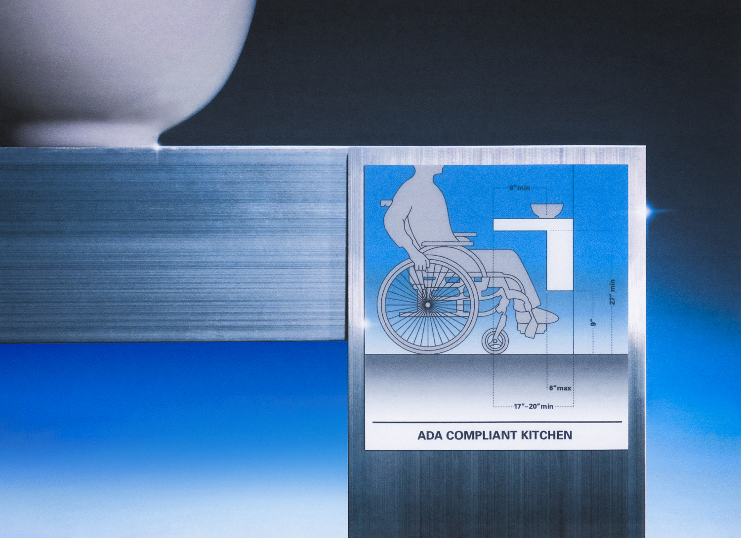 An illustrated, wheelchair-bound figure is constrained in a box set on an ombre black-to-blue background. The corner of a white bowl sits in the upper left hand corner.